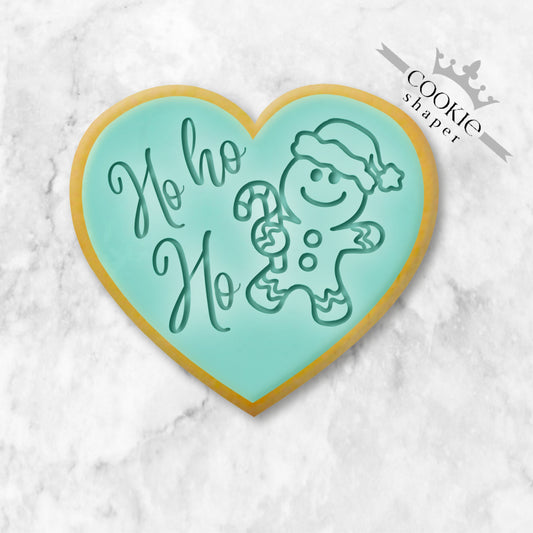 Custom Cookie Stamp and Cookie Cutter Ho ho Ho Christmas Heart. This beautiful Christmas biscuit embosser is designed for creating cookies and biscuits to wish family and friends a Merry Christmas. The perfect Christmas gift.